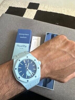 Swatch Blue Dial Pale Blue Bracelet Ceramic-Style Watch